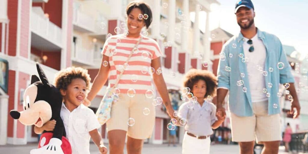 A family walking through Disneyland Resort in Anaheim, California.