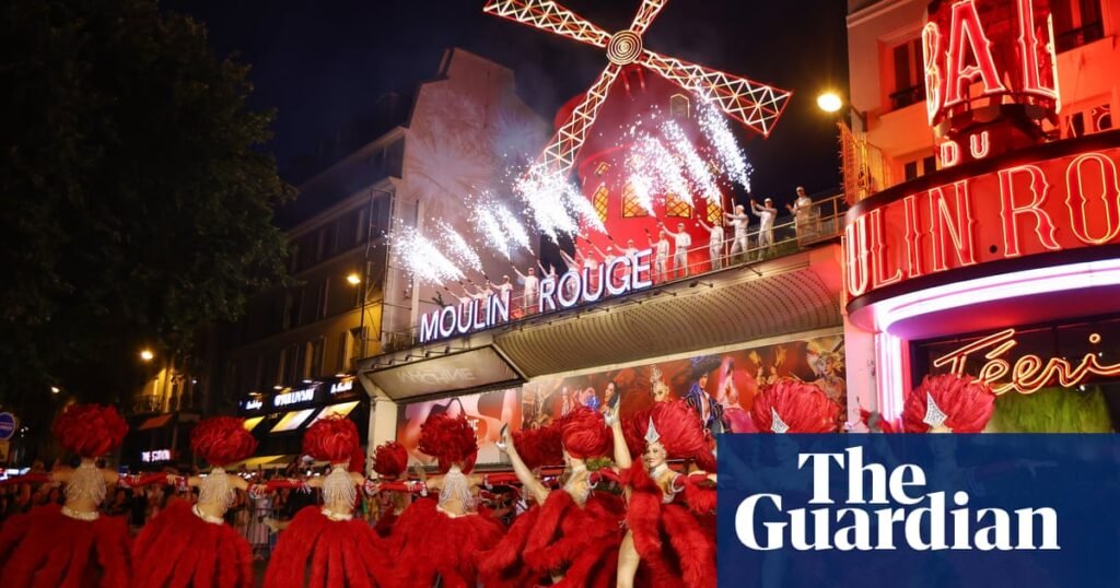 Paris rejoices as Moulin Rouge windmill sails turn again year after collapse | Paris