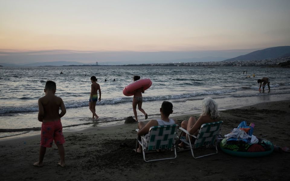 Beach on a budget: Greeks settle for day trips, priced out of iconic destinations
