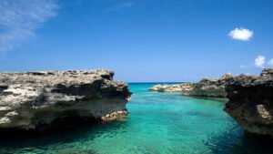 A new ad campaign from Cayman Islands urges guests to take it easy: Travel Weekly