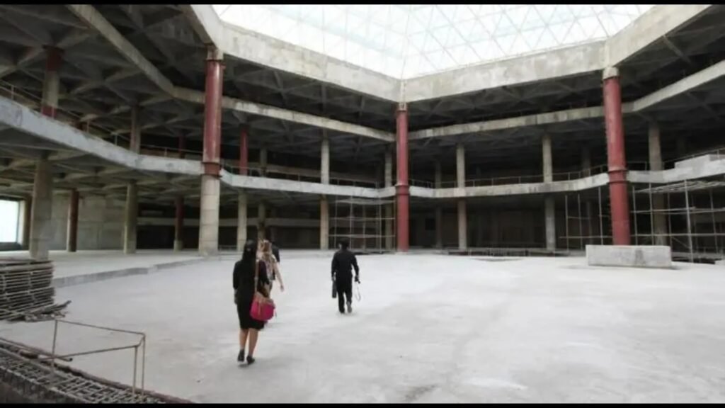 Look INSIDE mysterious abandoned 'Hotel of Doom' that's never had a single guest & is only used as a giant TV screen