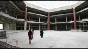 Look INSIDE mysterious abandoned 'Hotel of Doom' that's never had a single guest & is only used as a giant TV screen