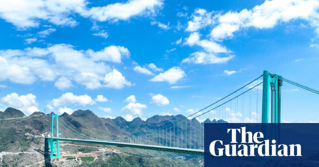 ‘I can touch the clouds’: how it feels to cross the world’s highest bridge | China