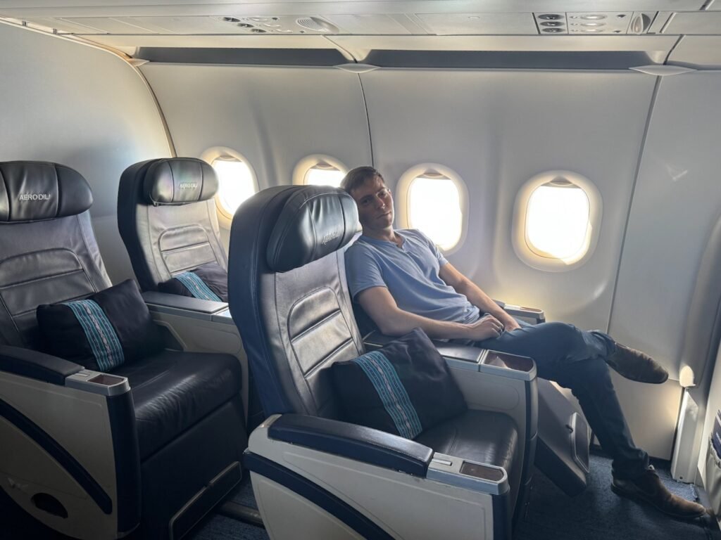 a man sitting in a plane