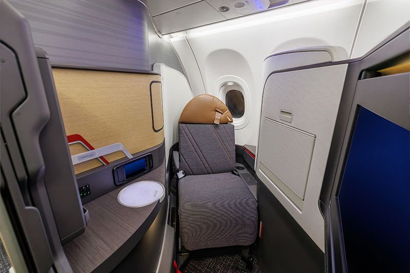 New American Business Class Seats Restrict Service While Watching TV