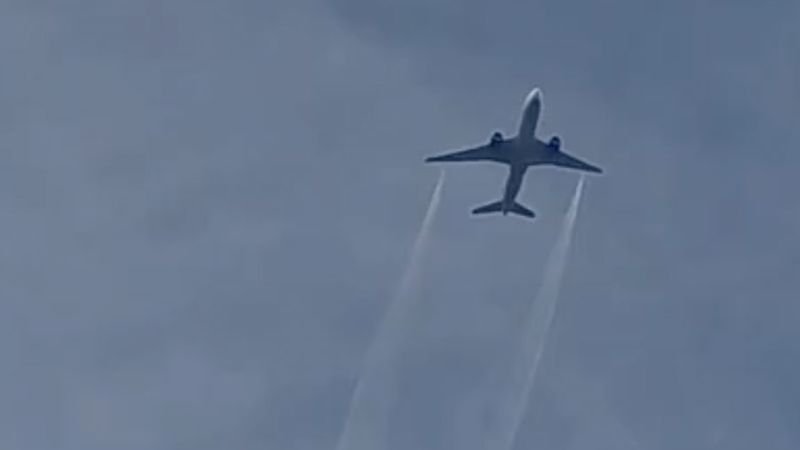 United flight to Tokyo returns to Dulles after losing power in an engine and igniting brush around runway