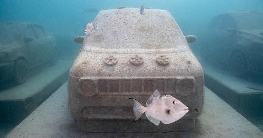 tour leandro erlich's underwater ‘traffic jam’ of concrete coral cars at miami beach's reefline