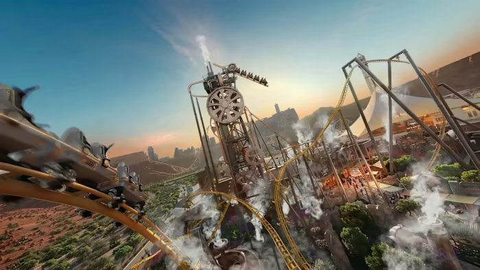 A CGI rendering of Steam Town in Qiddiya theme park featuring a dramatic roller coaster with steep drops, smoke effects, and a large central tower