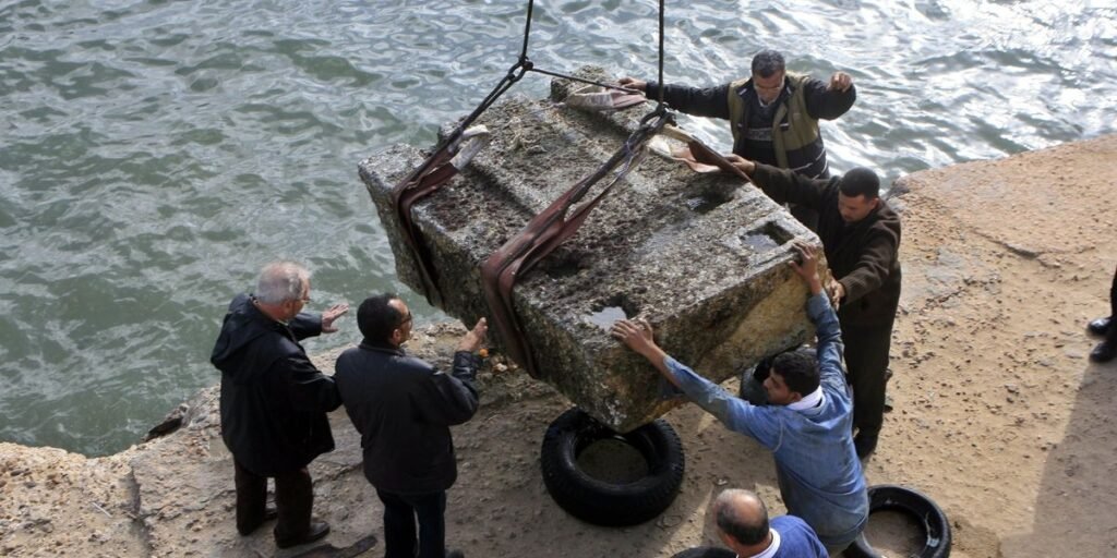 Archaeologists lift 80-tonne stones from seabed linked to one of seven wonders of ancient world