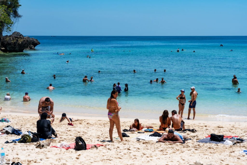 Tourists Relax on Bali Beach.jpg