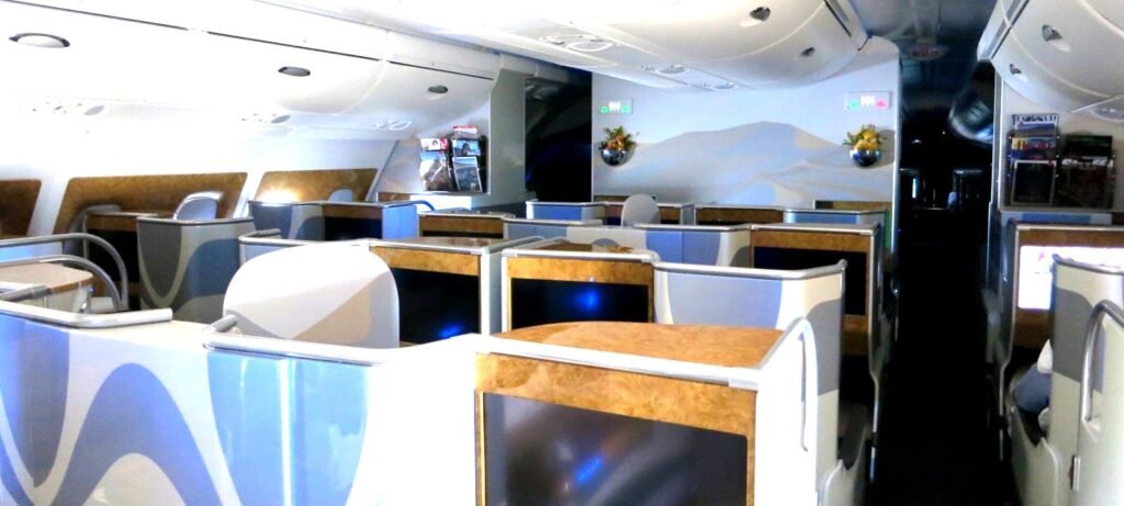 Influencer Goes Shirtless in Emirates Business Class — And It’s a Legitimate Hygiene Problem