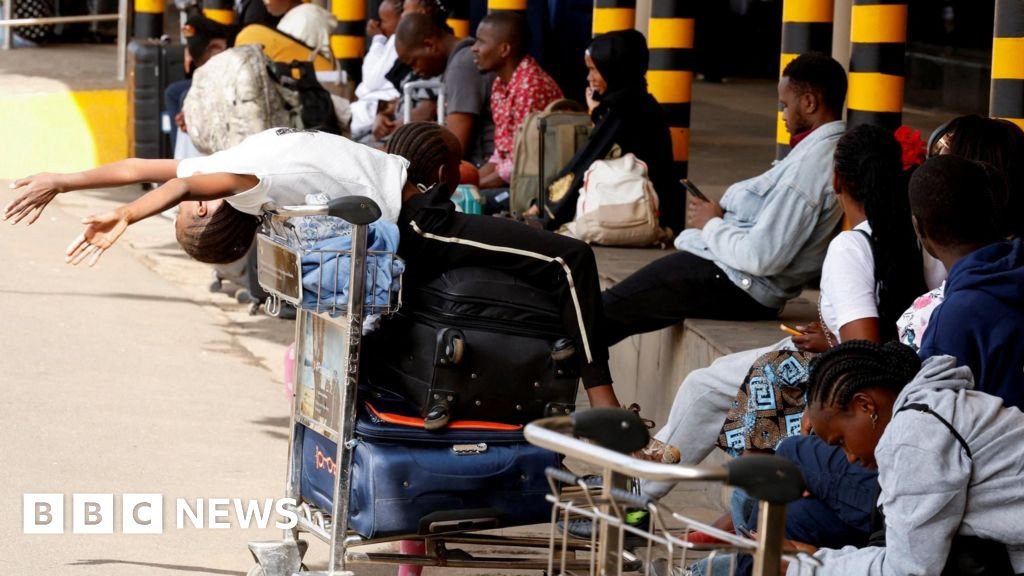 Kenya strike delays flights at international hub airport - BBC