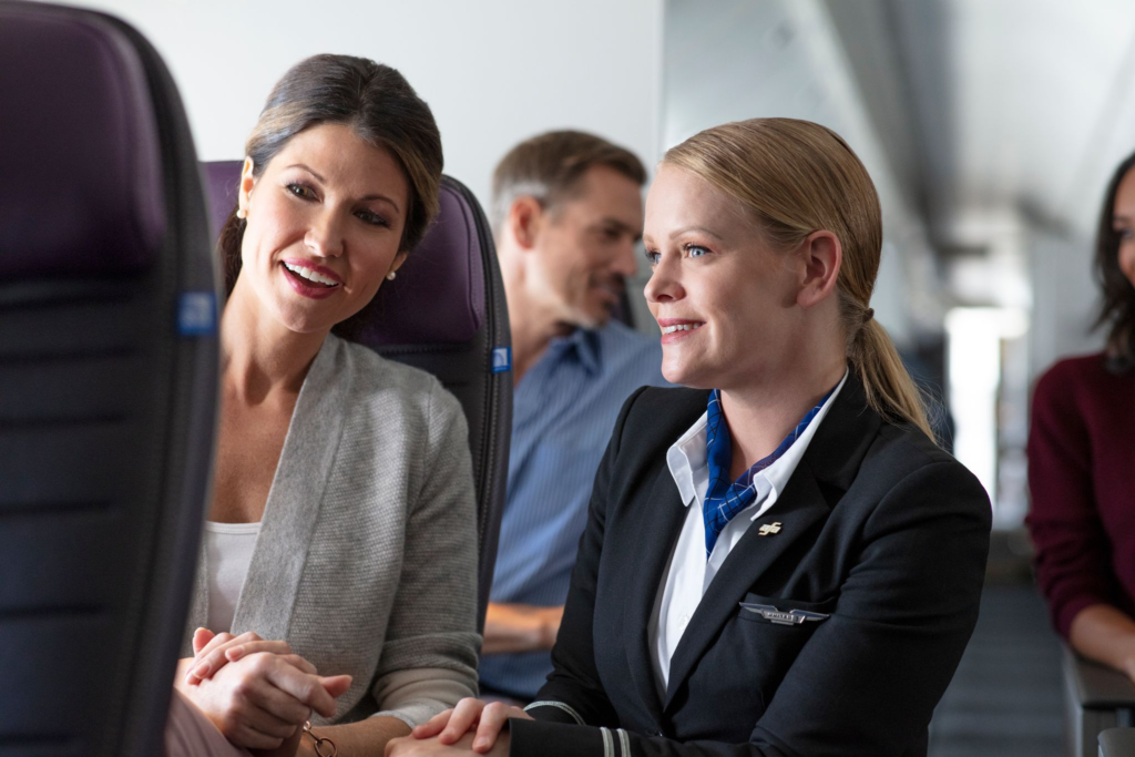 United Flight Attendant’s Hug to Distressed Passenger Goes Viral