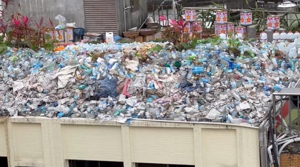 Yilan hotel ordered to clean up 'mountain' of plastic bottles on roof