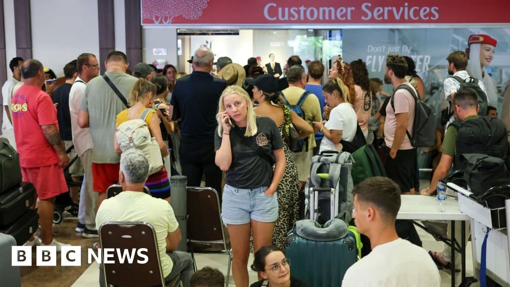 Flights cancelled and new travel warnings issued after Iran strikes - BBC