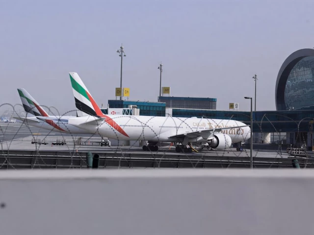 planes are parked at terminal 3 of the dubai international airport following the united states and israel strikes on iran in dubai united arab emirates march 2 2026 photo reuters