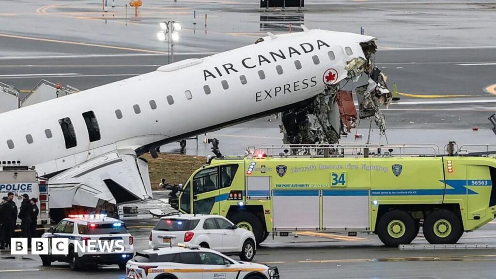 LaGuardia: Two pilots killed and New York airport closed after plane hits fire truck - follow live