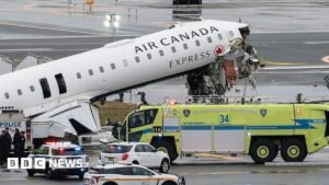 LaGuardia: Two pilots killed and New York airport closed after plane hits fire truck - follow live