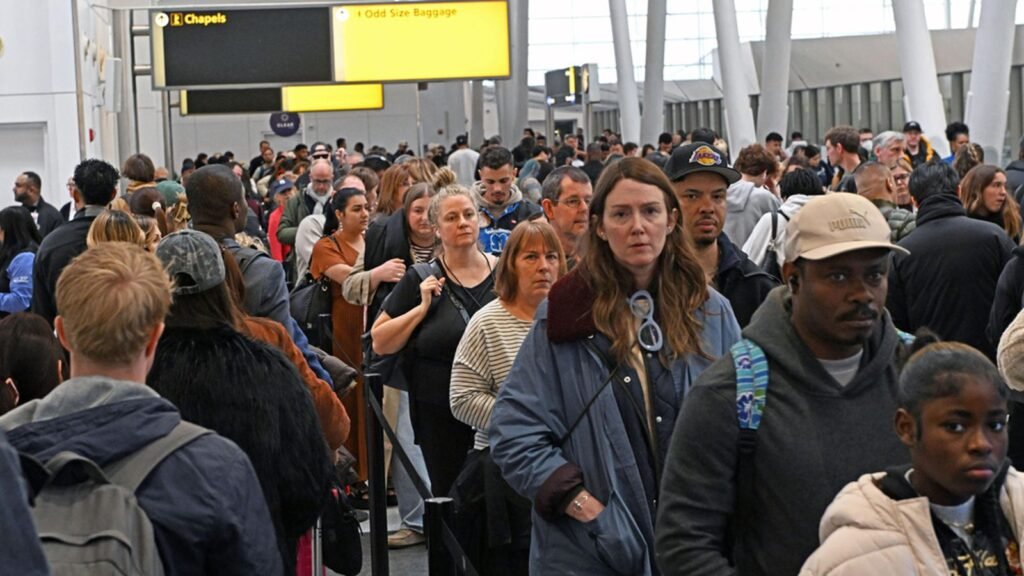 Passengers at some airports are dealing with long wait times due to high absence and staff quitting. Pic: AP