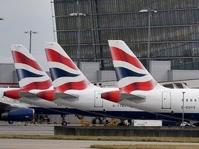 British Airways planes sit on the tarmac at Heathrow airport in London.