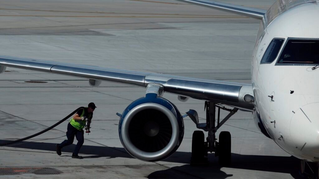 Jet fuel prices double, leading airlines to increase baggage fees, raise fares : NPR
