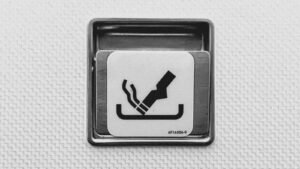 Airplane Ashtrays Still Exist Because People Have A Hard Time Following Rules